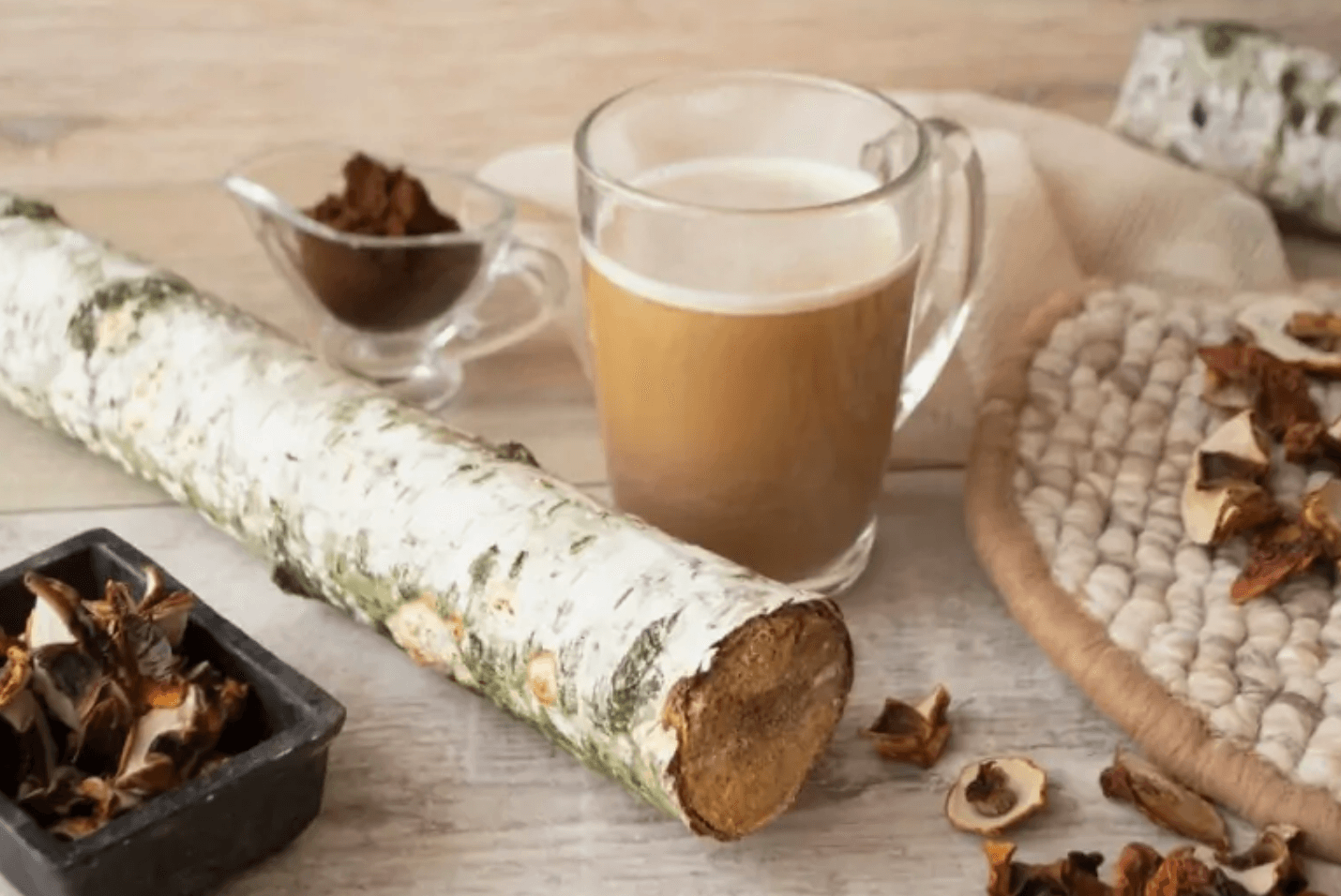 chai tea, and petals on a wood table 