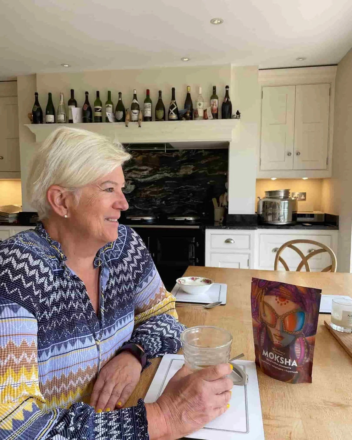 Customer holding Moksha at home