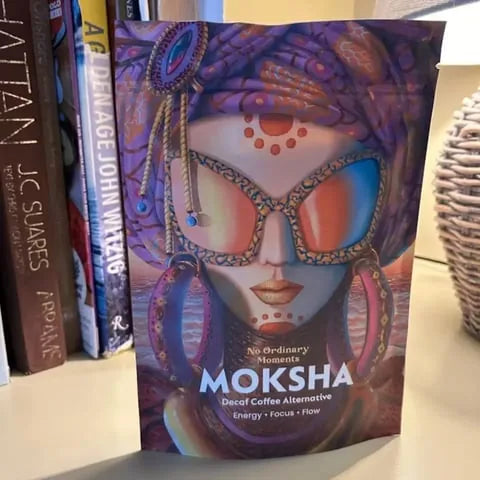 Moksha and a cup on a shelf